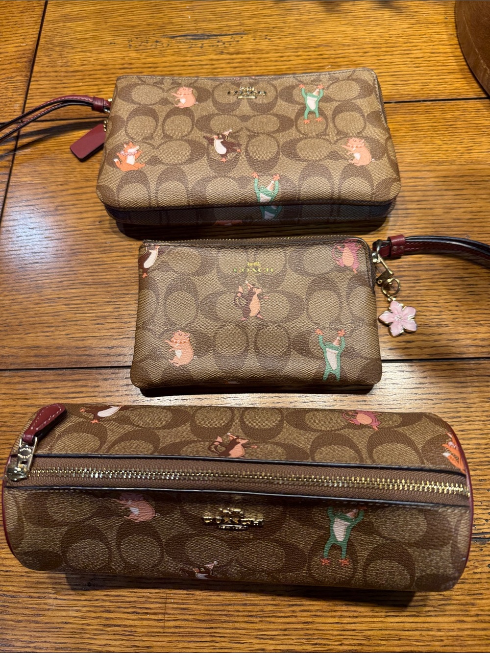 Coach Tan Signature Canvas Pouch Set with Pink & Green Accents